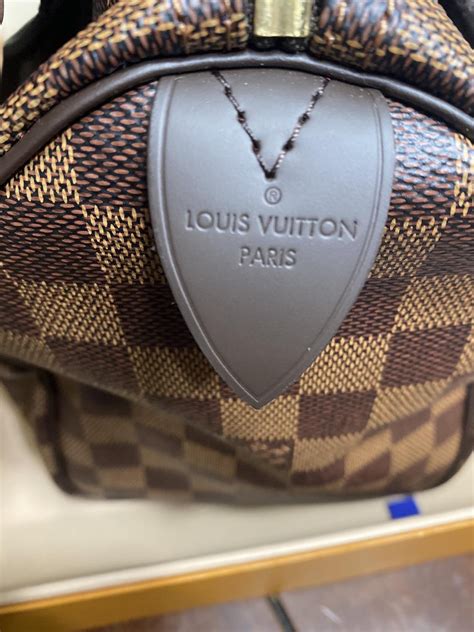 tampon vrai louis vuitton|tampon Louis Vuitton faux.